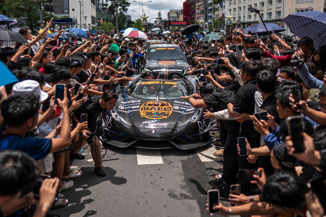 Supercars departing Ho Chi Minh City after flag drop.