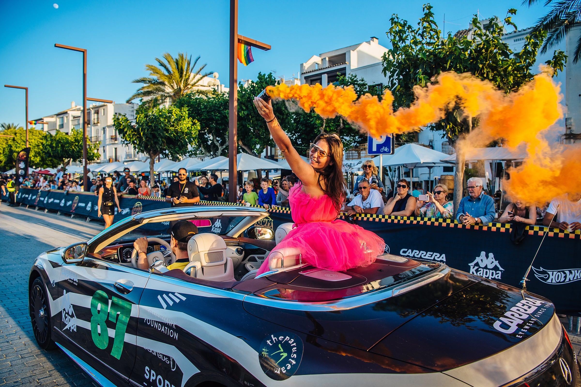 Team 87 celebrating in style as they cross the finish line in Ibiza 